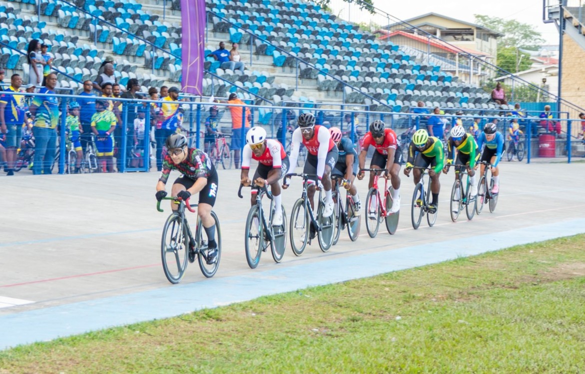 George Qadado leading a pack of cyclists during a track race
